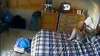 Voyeuristic Mother Indulges In Solo Pleasure While Watching Her Son'S Porn Film, Captured By A Hidden Camera
