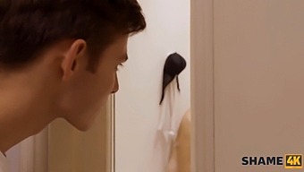 A Young Man Joins An Older Blonde Woman In The Shower And They Engage In Sexual Activity